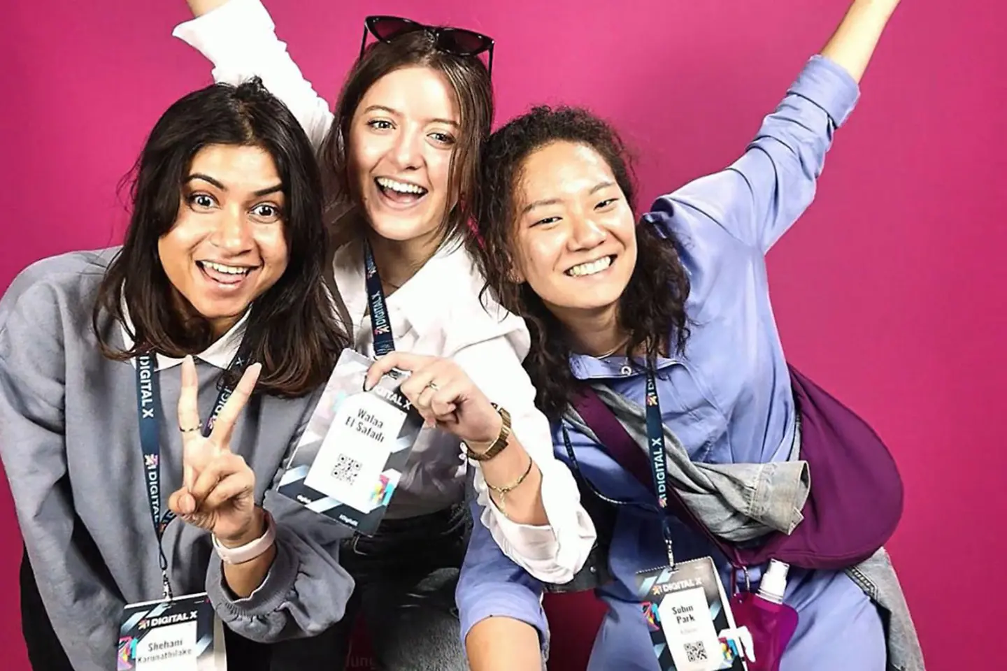 3 women at an event stage