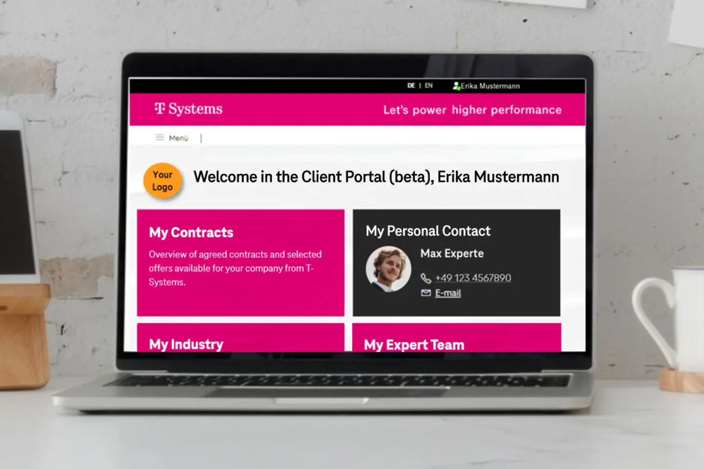 T-System's website homa page displayed on a laptop