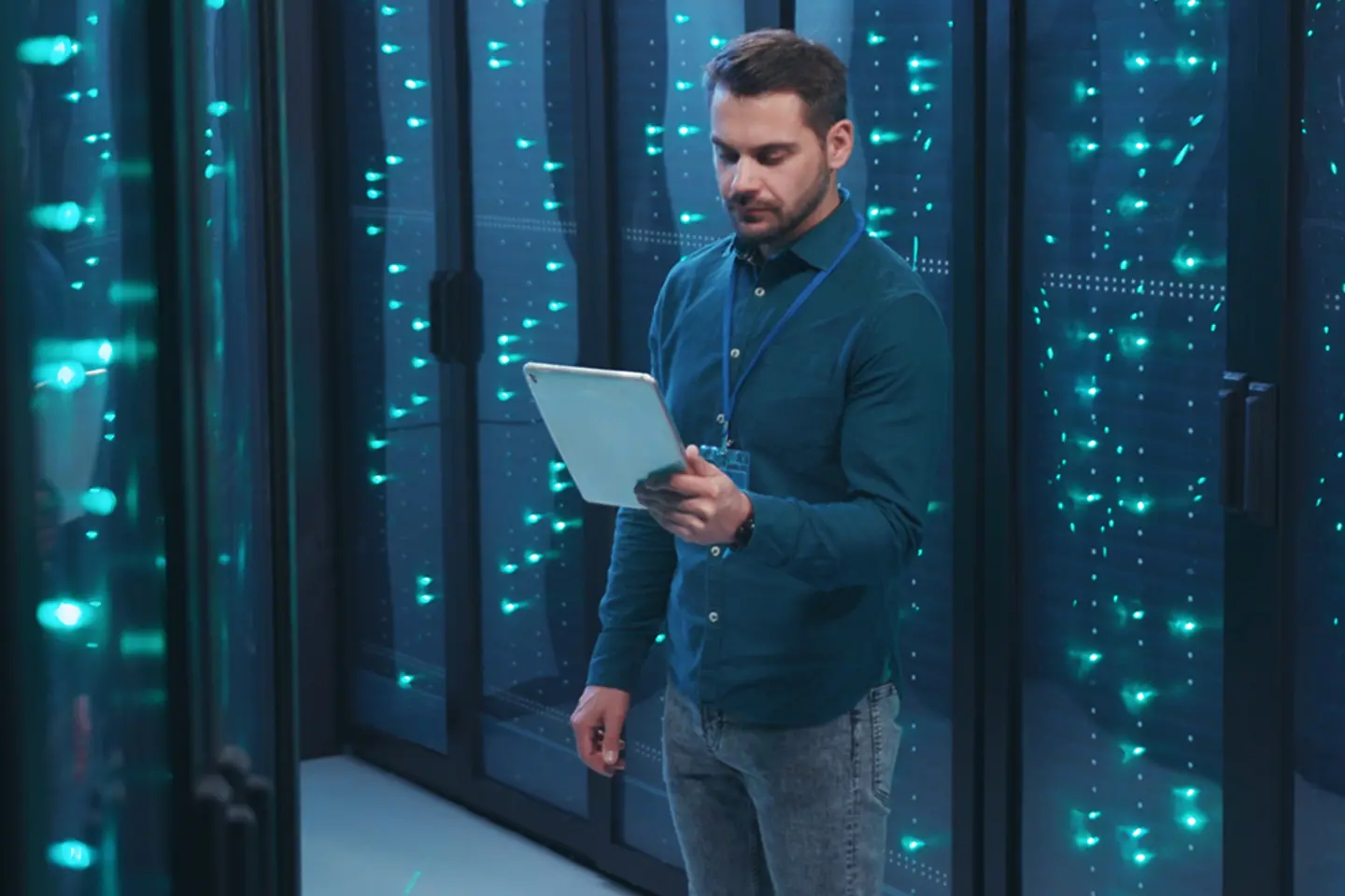 IT professional with a tablet in high tech data center