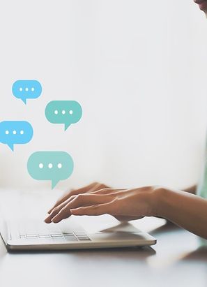 Nurse chatting on laptop