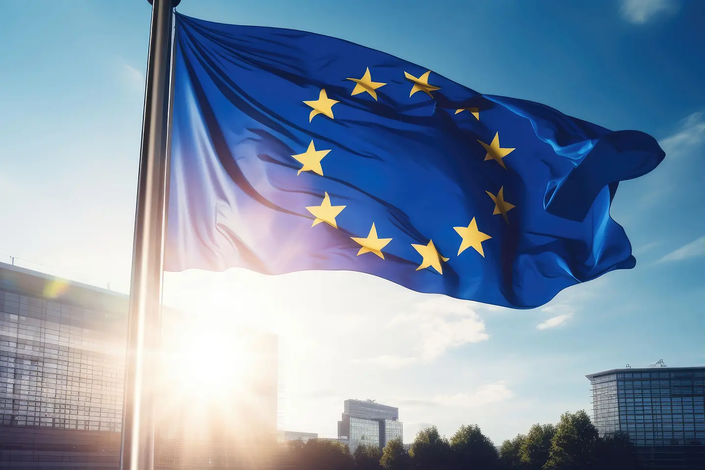 Die EU-Flagge weht vor einem modernen Gebäude bei Sonnenschein - AI generated/adapted