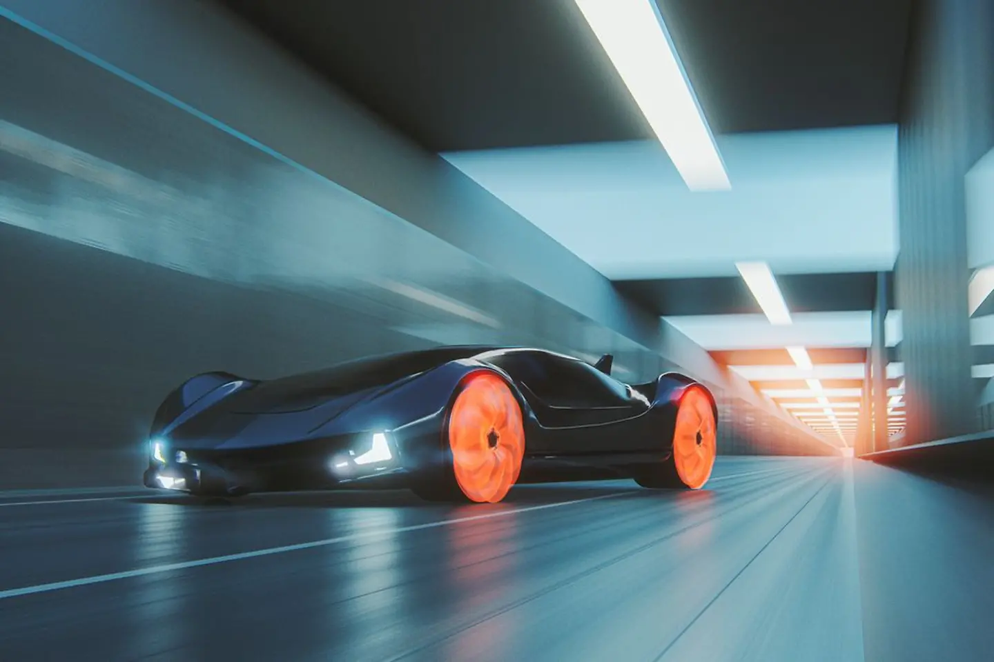 Futuristisches Auto mit orange leuchtenden Rädern fährt in einem Tunnel