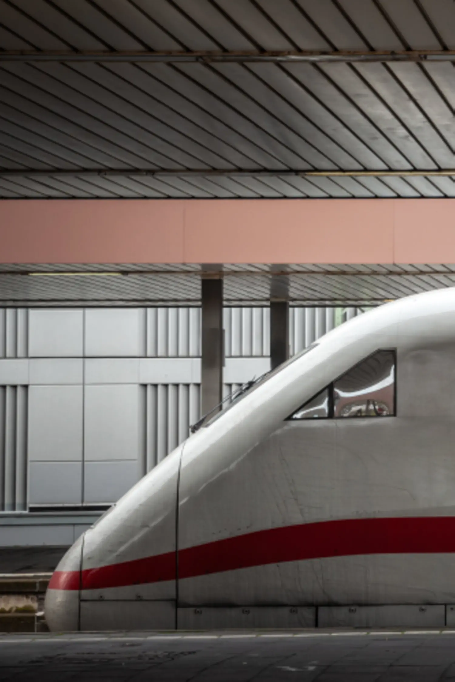 Main railway hub of the german city with a german high speed train in background