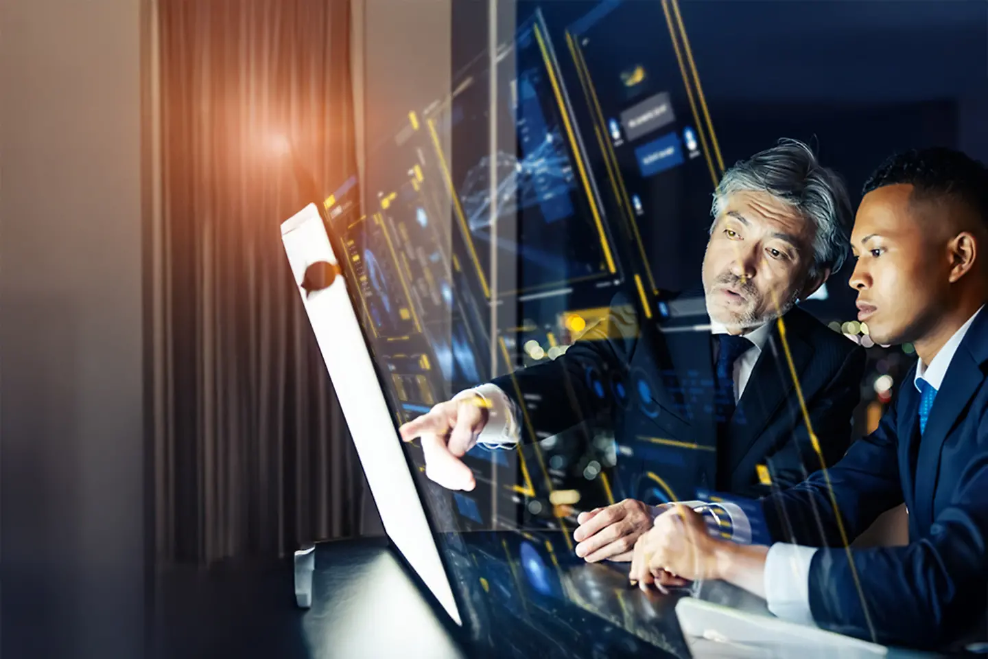 Businessmen working on virtual touchscreen