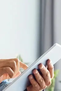 Man using tablet to educate himself