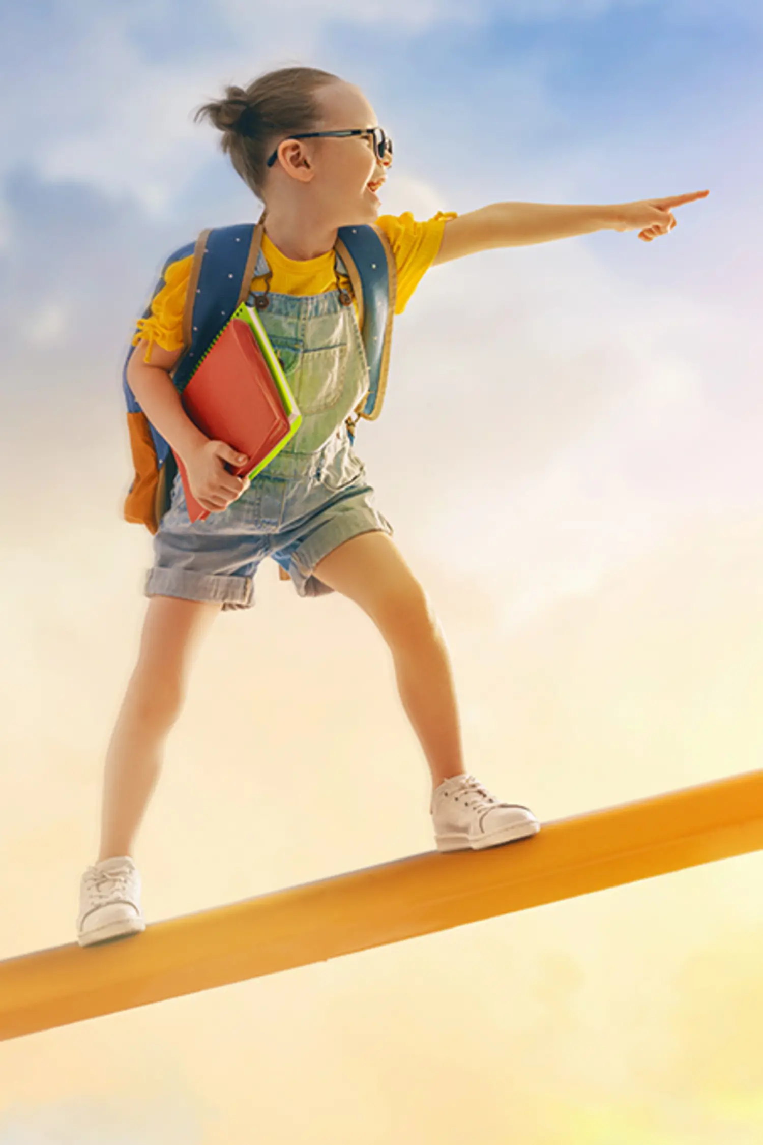A schoolgirl flies through the clouds on an oversized pencil