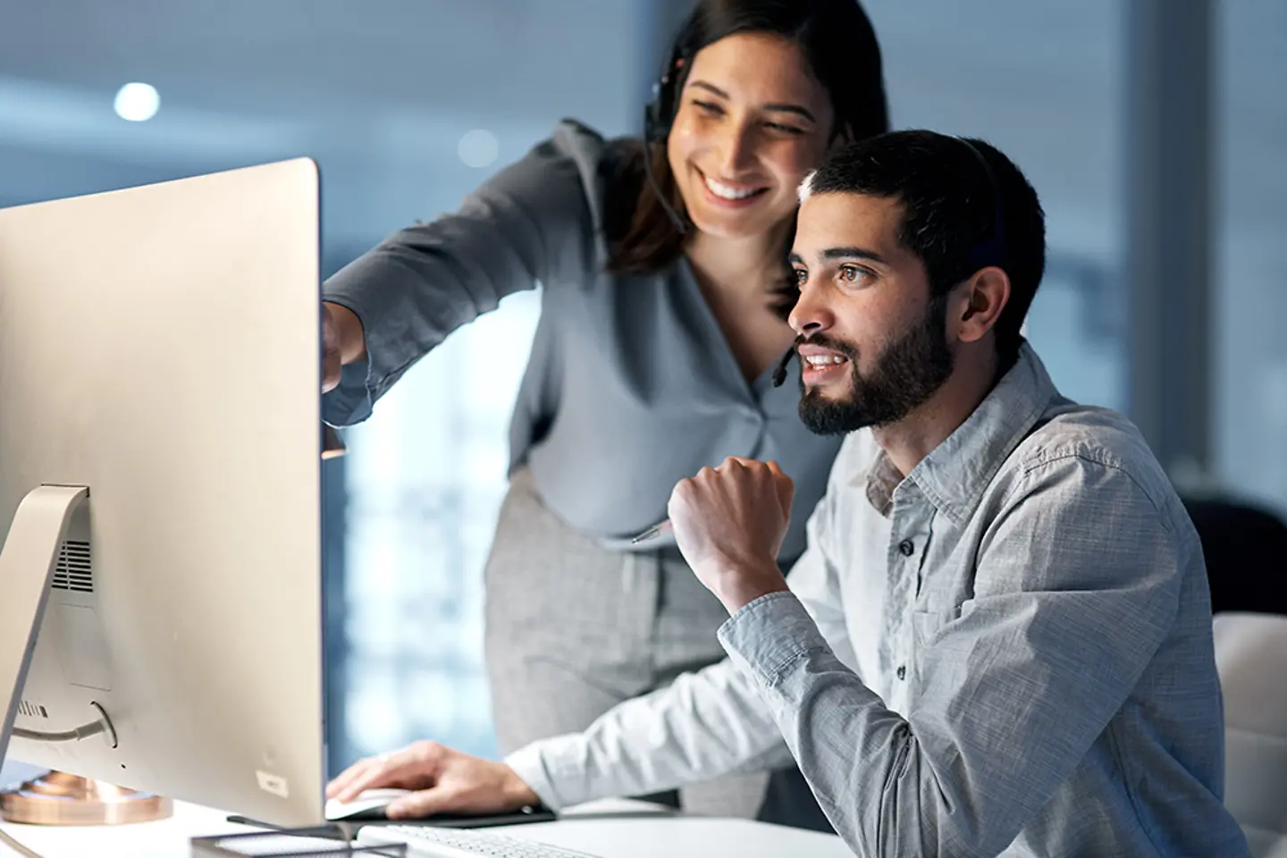 Call center, manager and telemarketing team at computer for software training