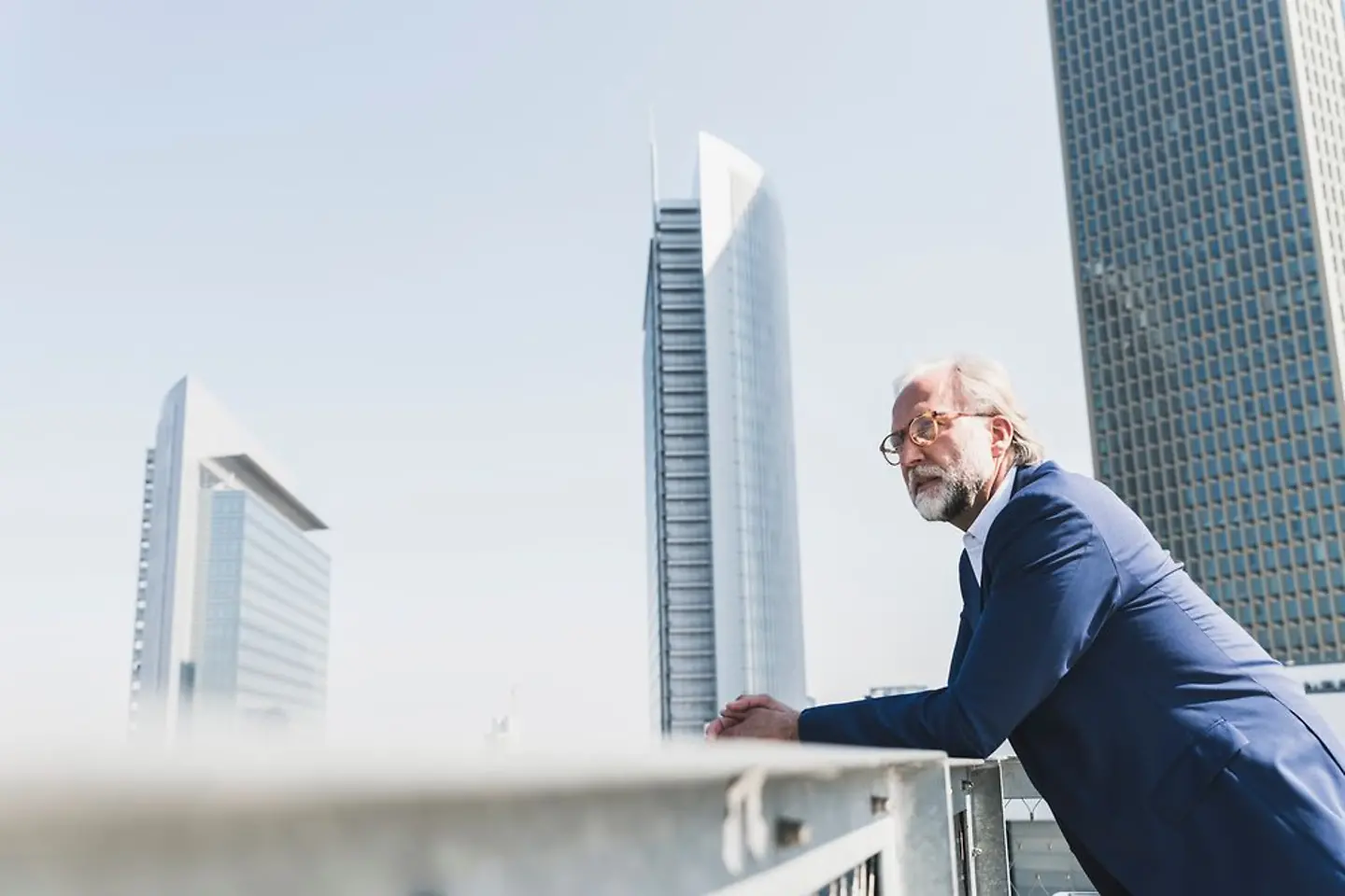 Businessman looking at skyscrapers