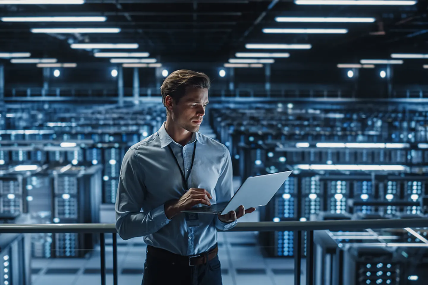 Security specialist checking data in server room