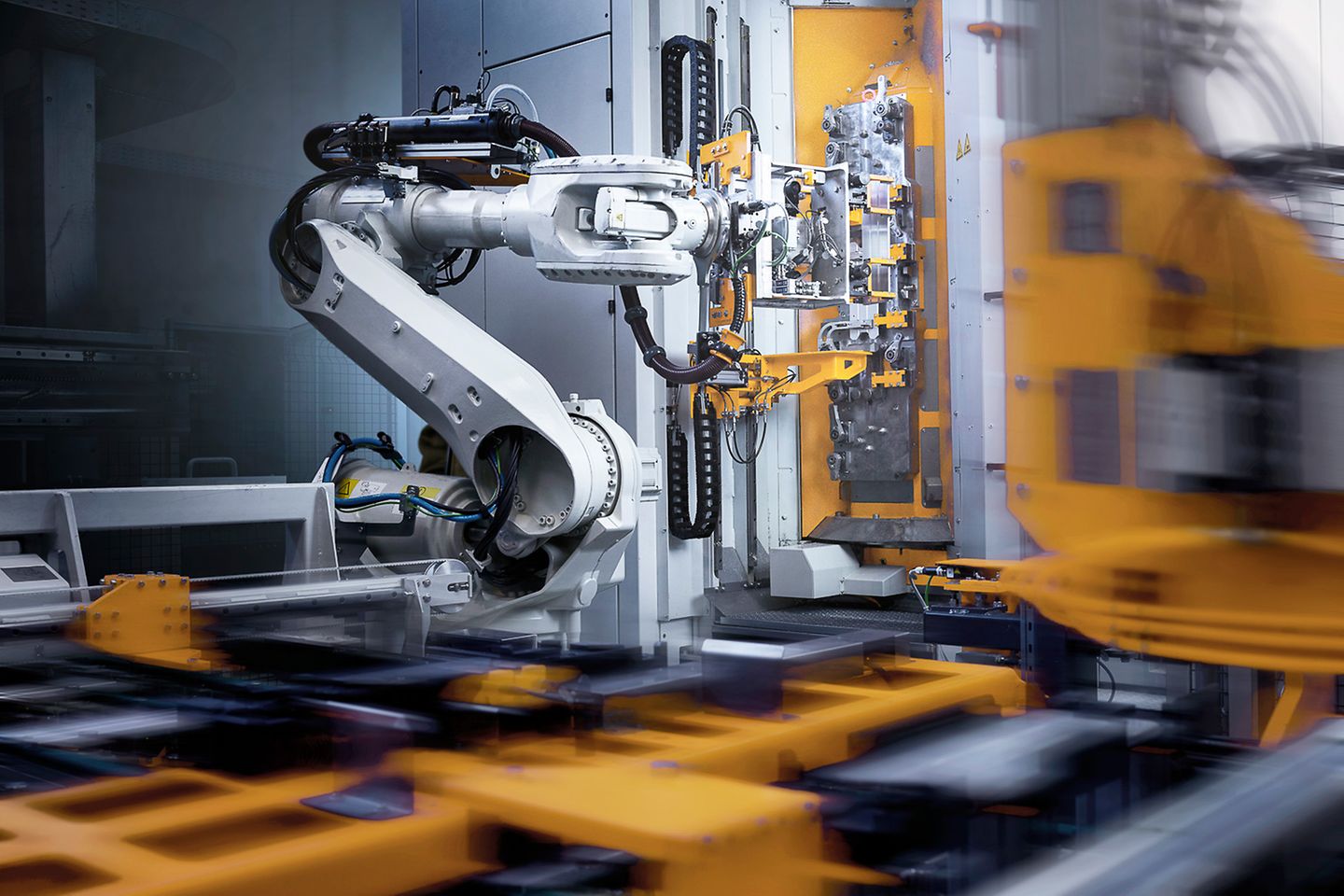 Working industrial robot in a digitized factory