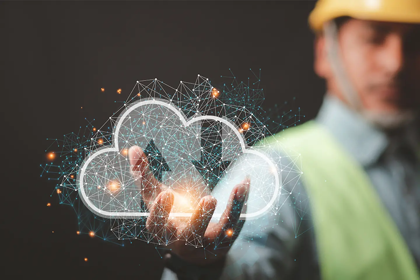 engineer demonstrates cloud connectivity to exchange industrial systems, technologies, industry cloud technology concepts.
