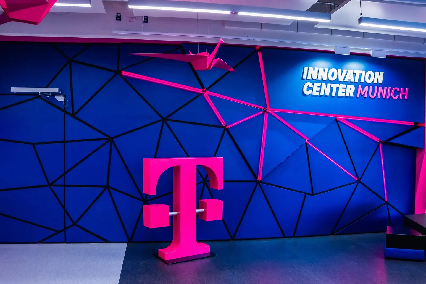 Telekom Logo, view of the interior of the Innovation Center in Munich