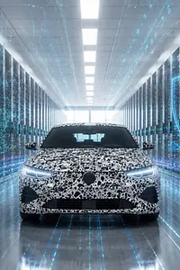 KI-generiertes Bild - Digitales Bild von einem Volkswagen mit Abbildungen von Europa, Cloud- und Cybersecurity-Symbolen
