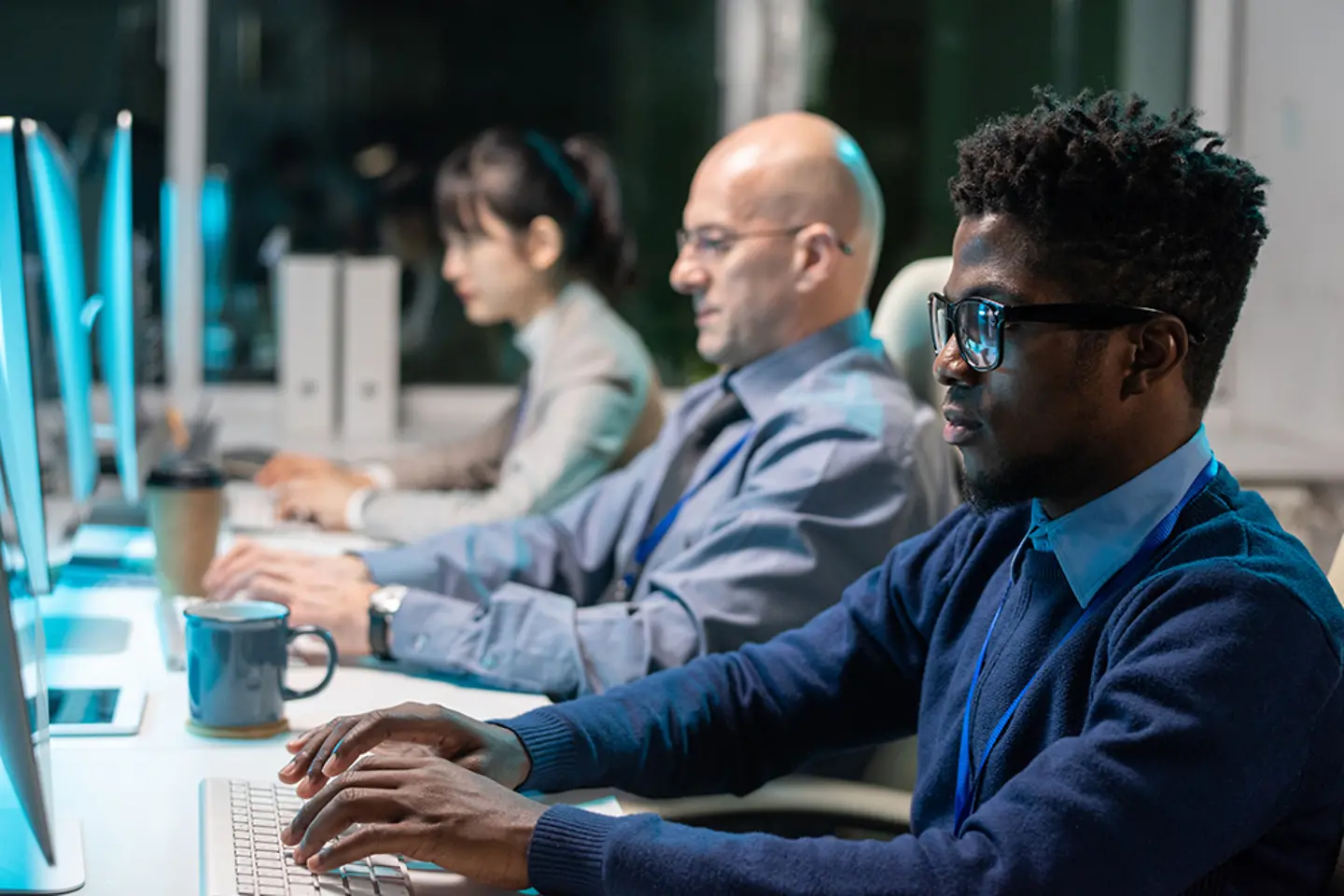 IT experts working on their computers in the office