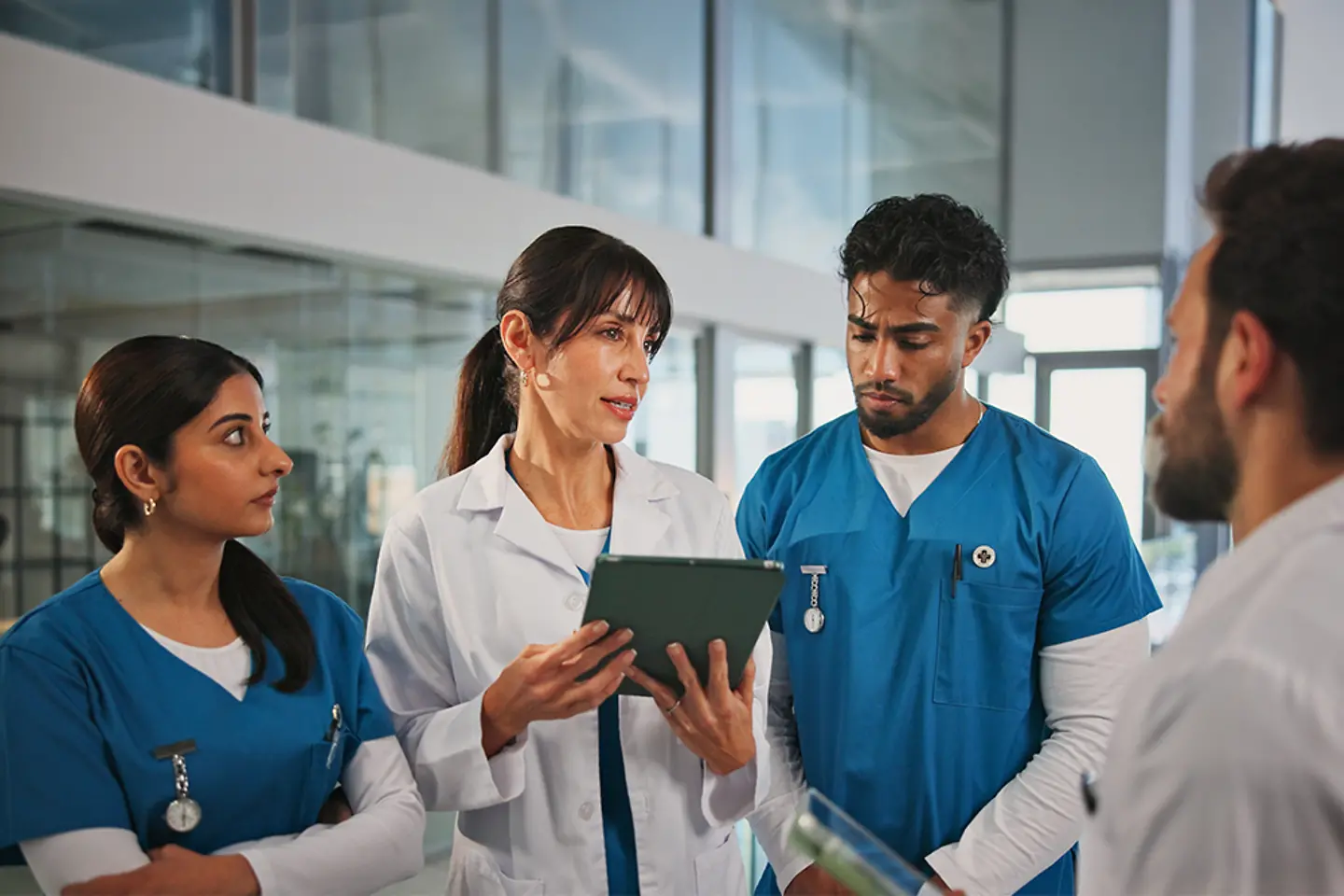 Healthcare staff discussing the TI connection