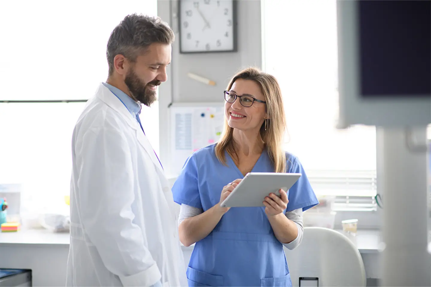 Doctor and nurse with a tablet