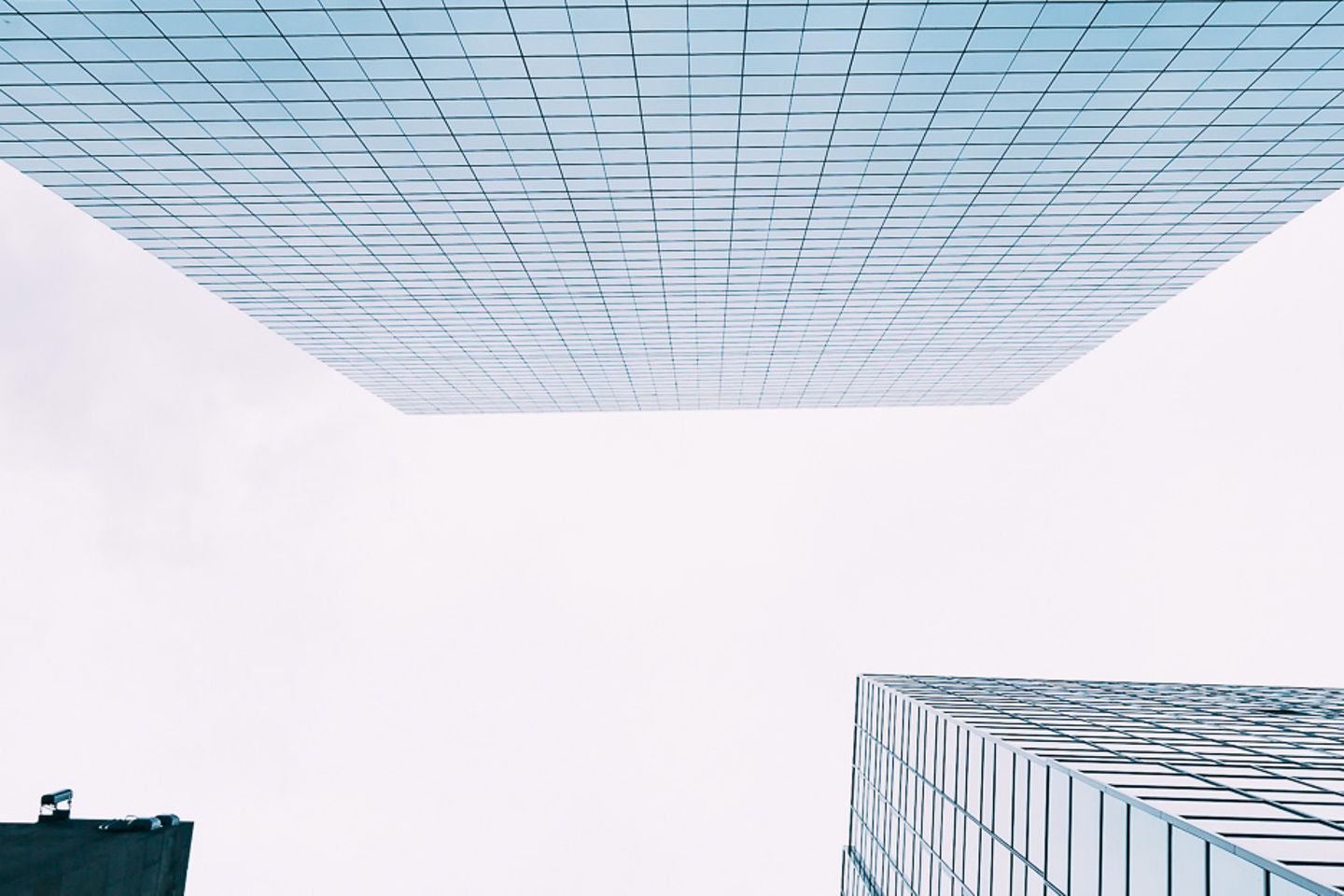 Several modern skyscrapers seen from a low angle perspective