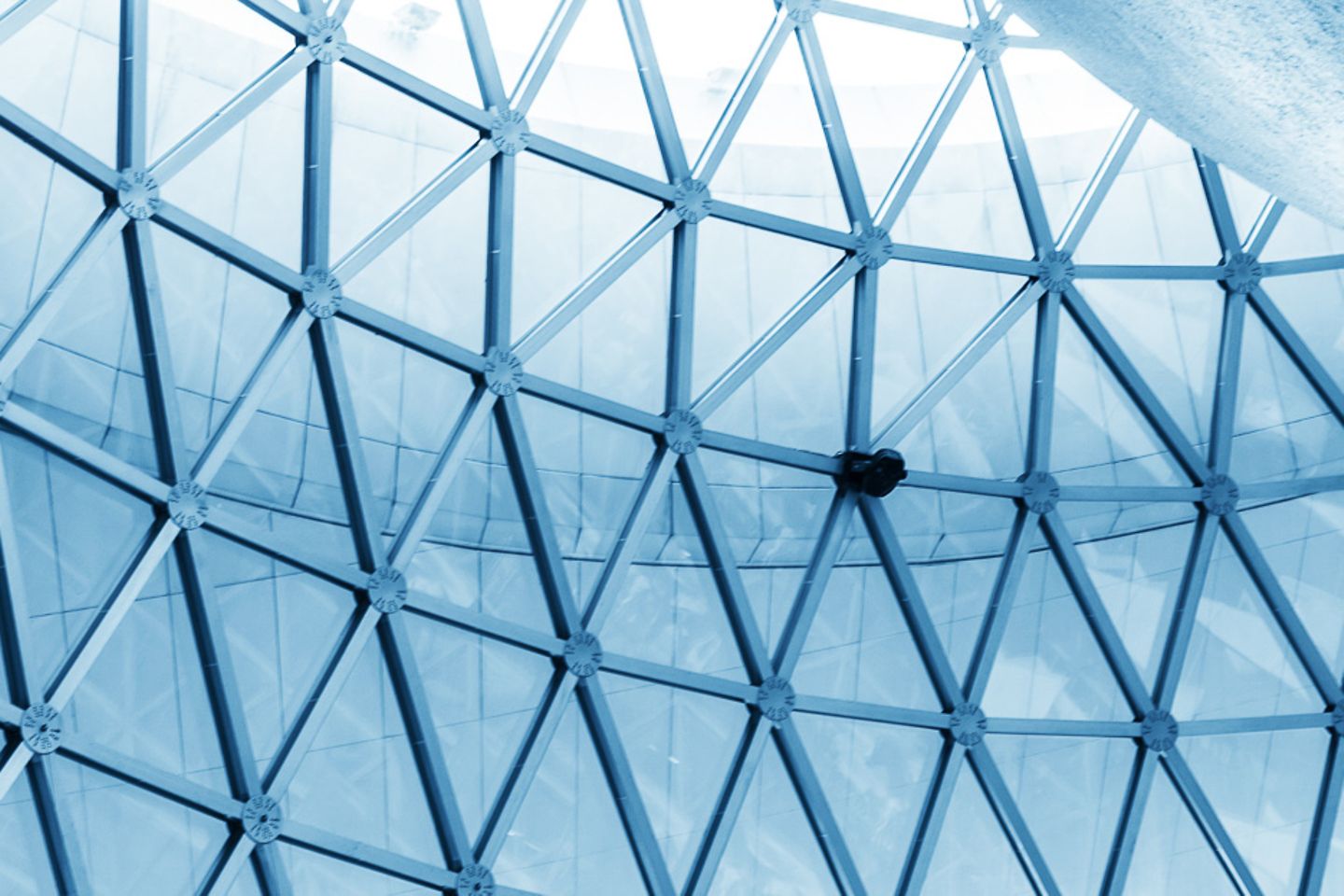 Low angle view to a dome made of steel construction with windows