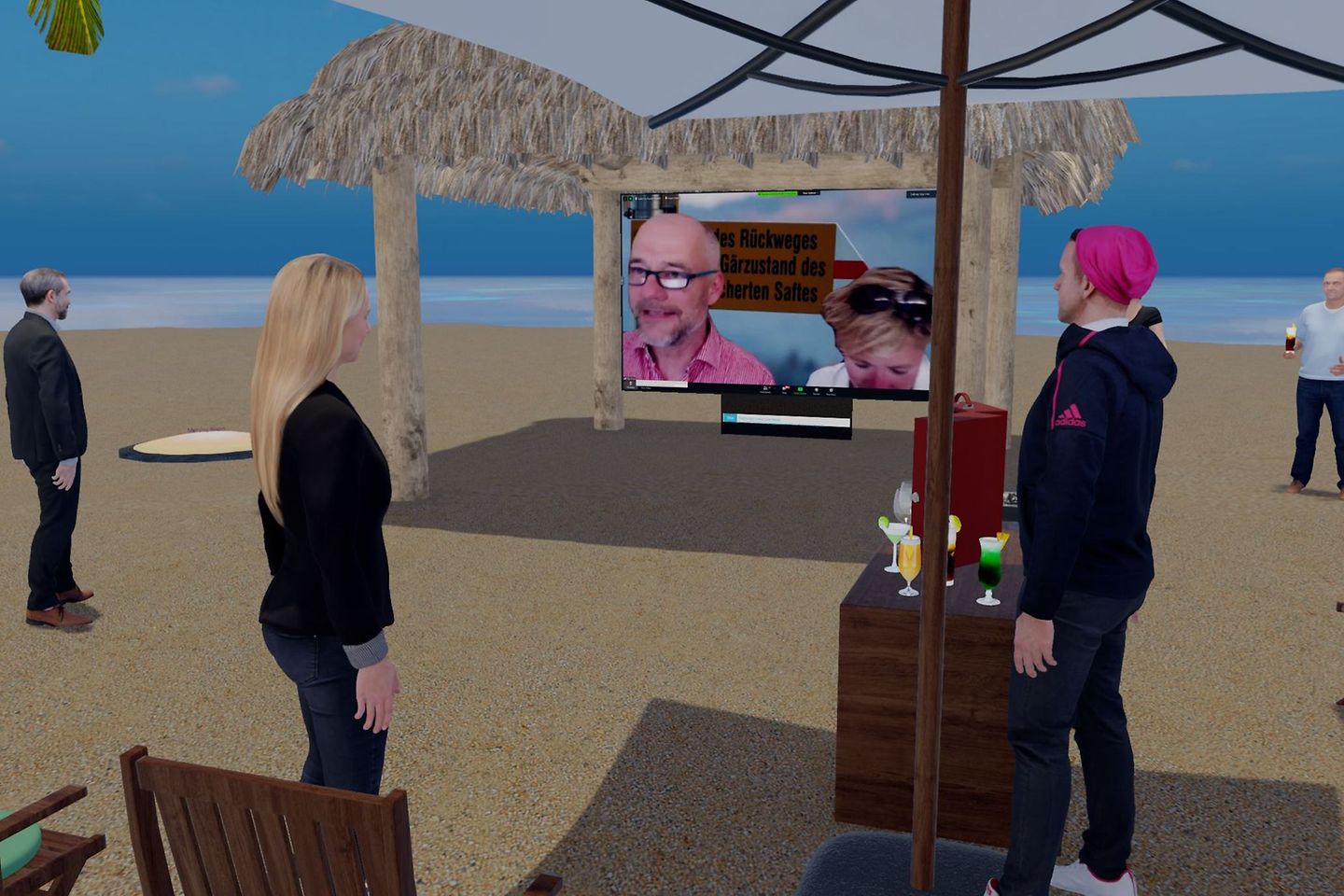 Videokonferenz an einem virtuellen Strand, es gibt einen Bildschirm mit zwei Personen darauf, zwei andere Personen stehen 