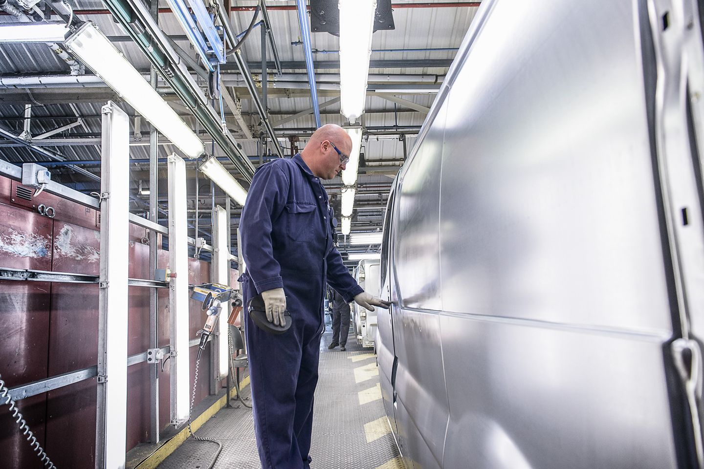 Car worker in production