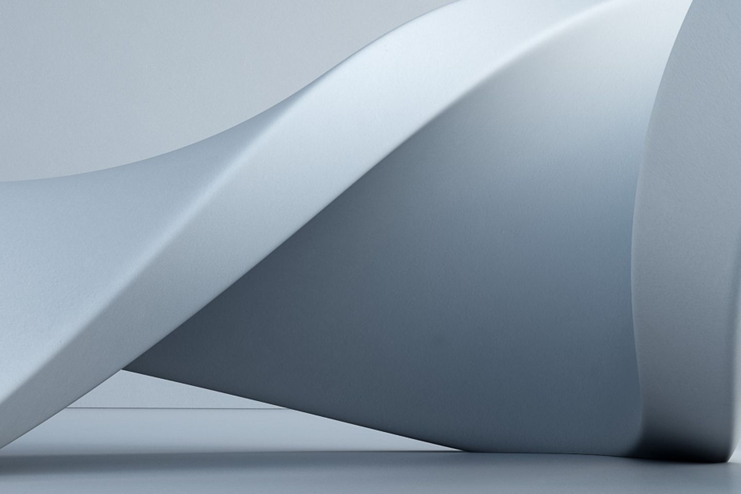 Geometric white spiral on the ground against a grey background