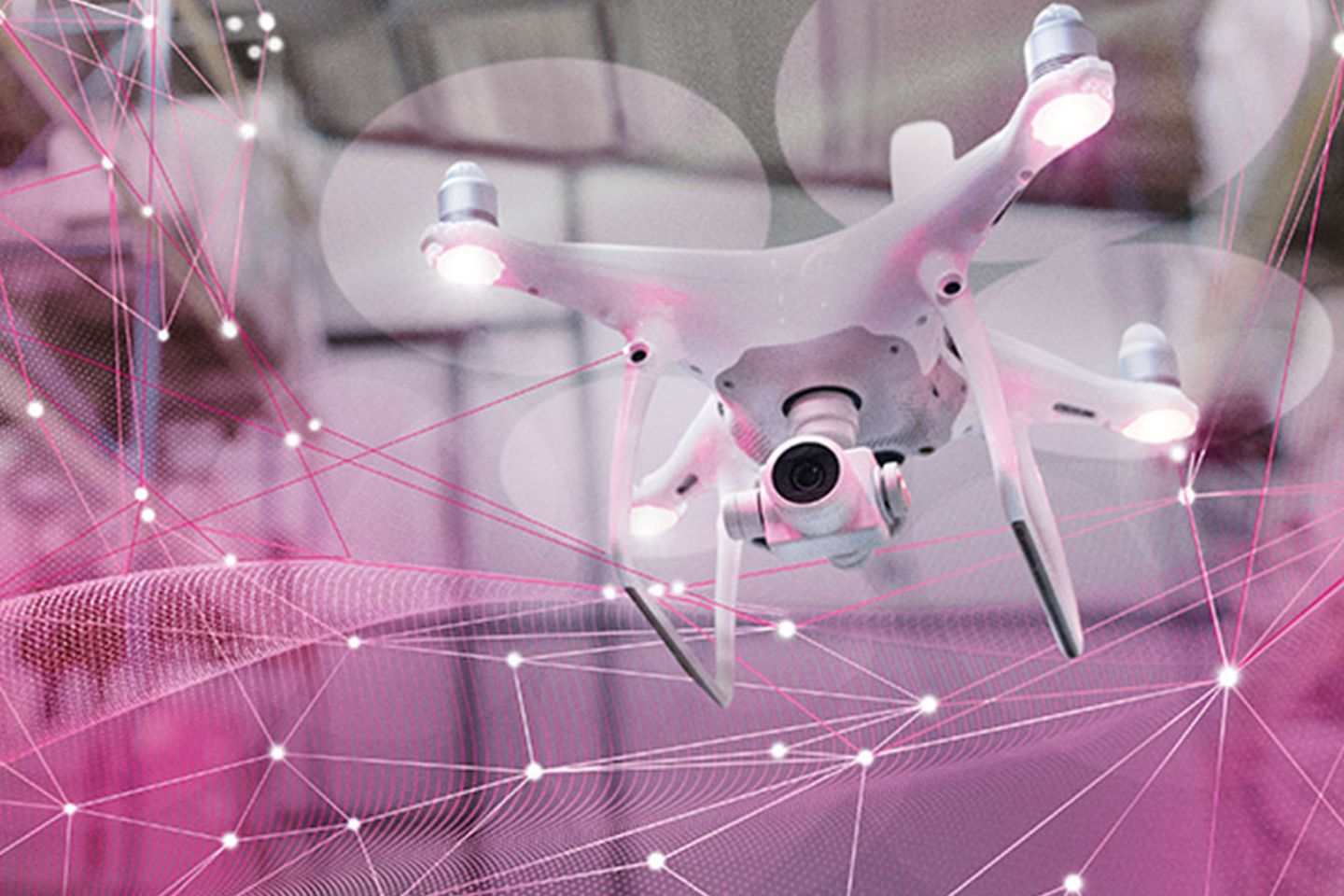 Dron virtual en un almacén sobrevolando una nube virtual de puntos conectados de color rosa