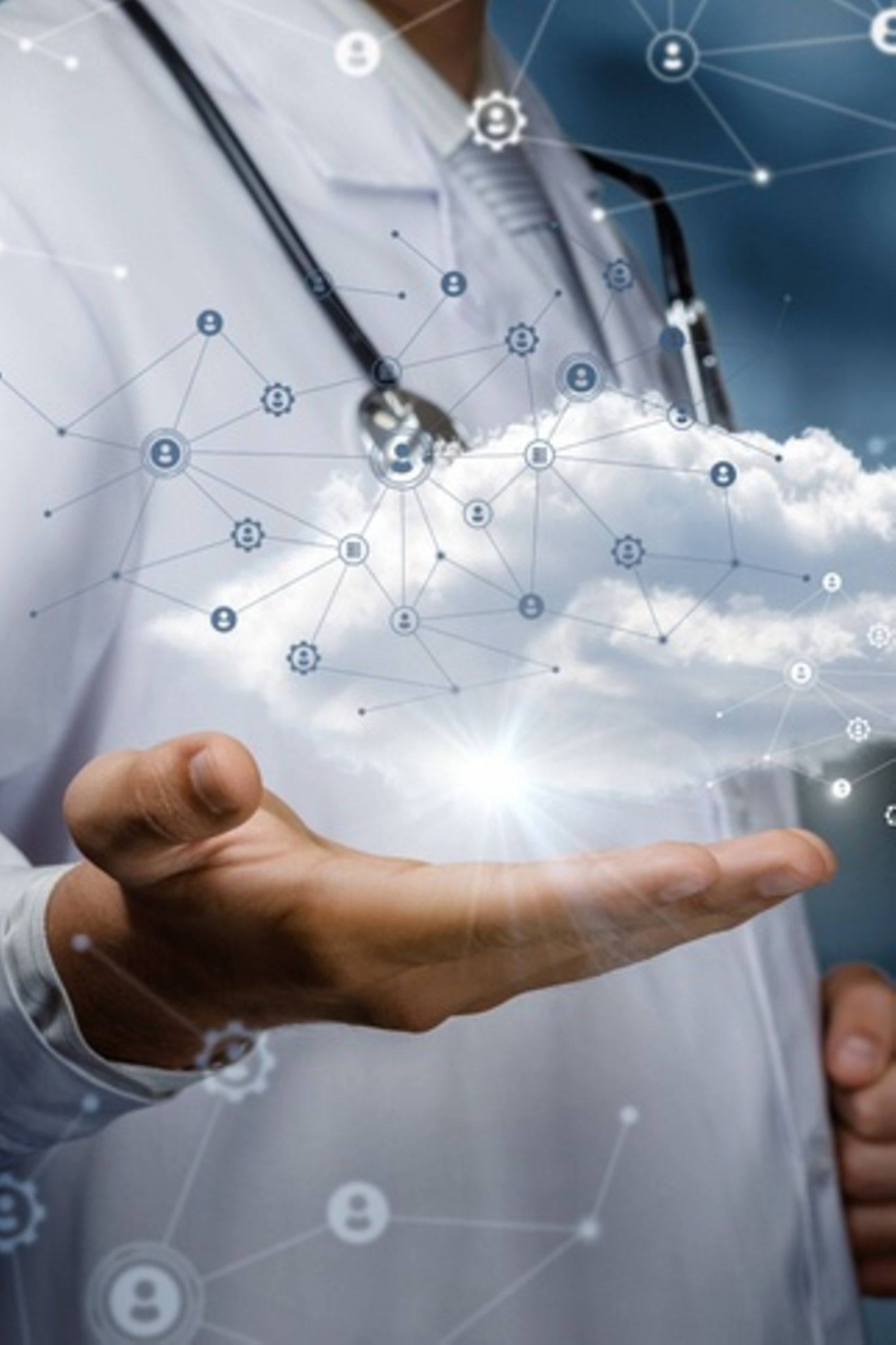 A medical professional holds a data cloud in his hand