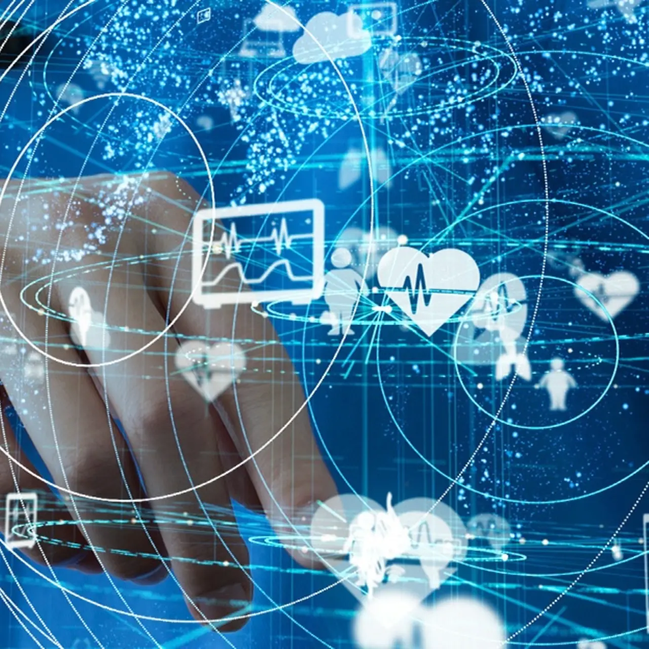 A woman in blue hospital clothes holds a tablet in her hand over which various icons are circling.