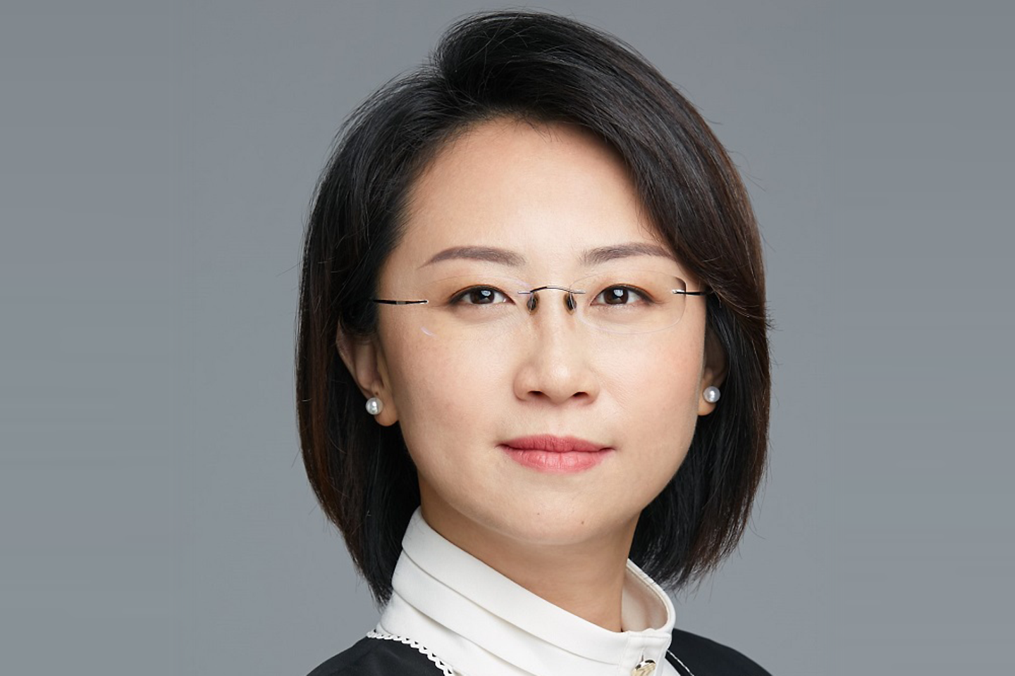 Portrait of Mi Luo, Member of the Management Board of T-Systems P.R. China Ltd