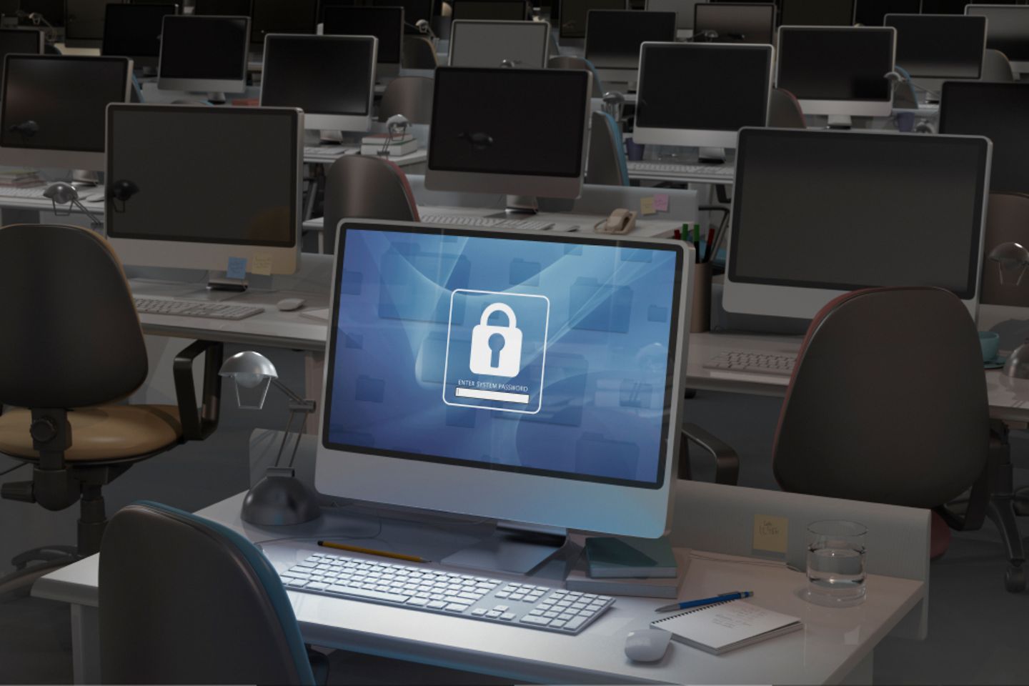 A room full of monitors and one monitor showing a white security lock on a blue background