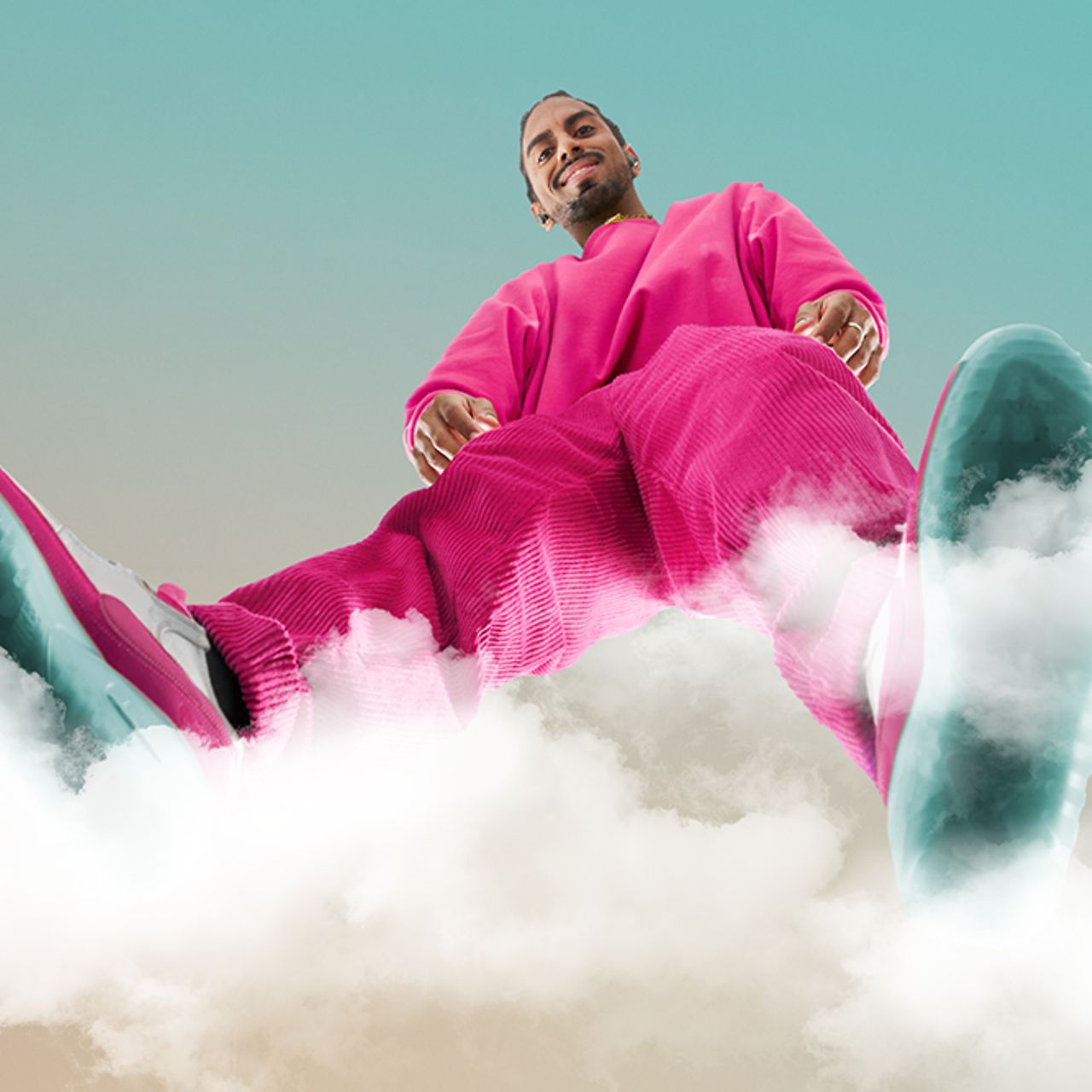 A person in a pink outfit stands on a cloud