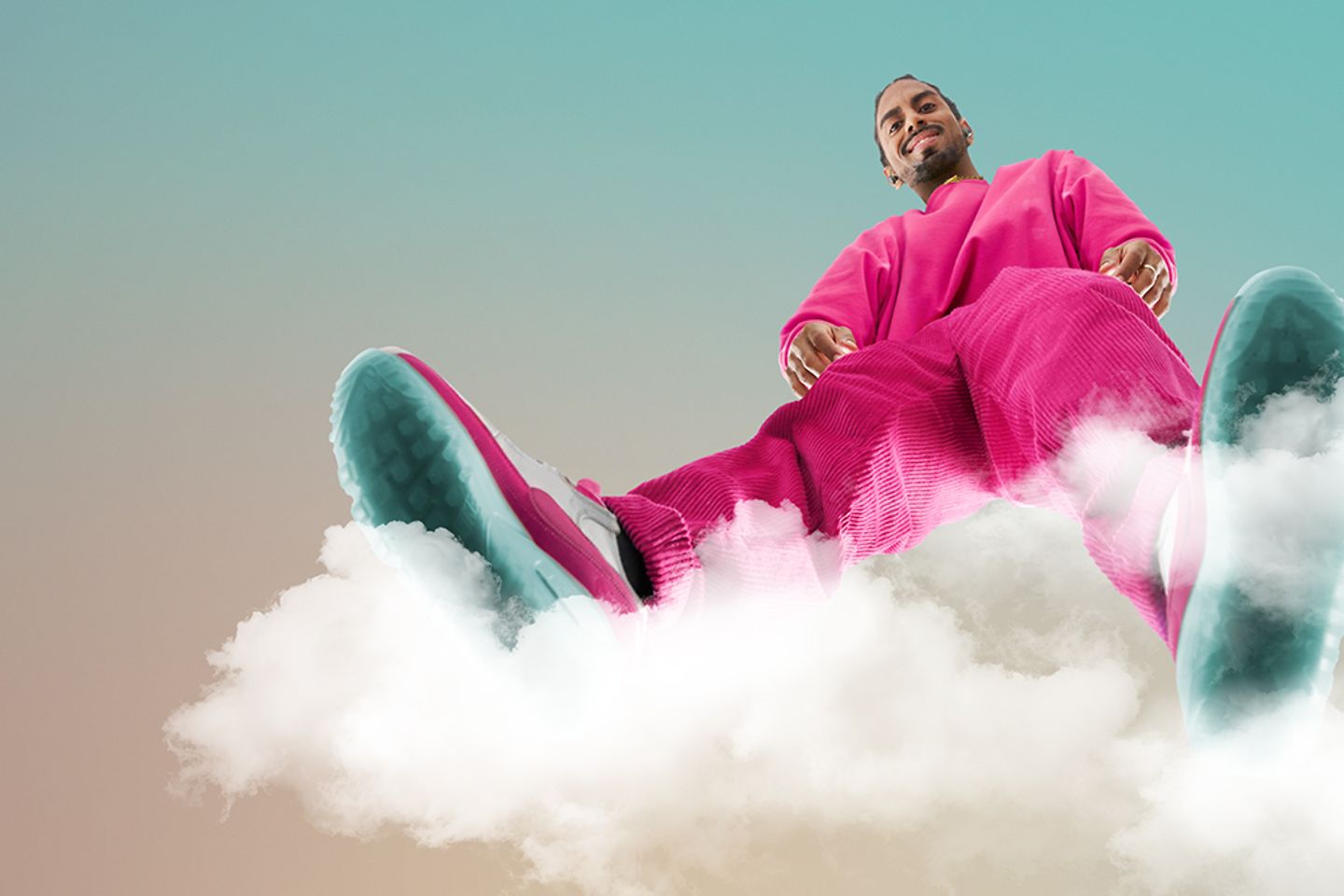 A person in a pink outfit stands on a cloud