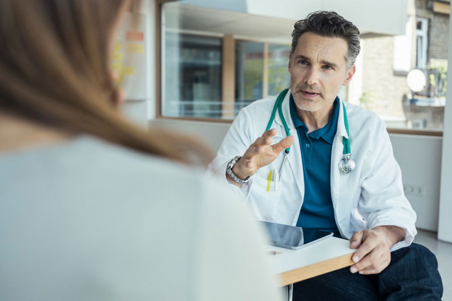 Doctor consulting with a patient