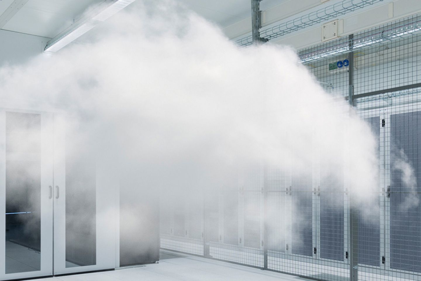 Server room with cloud in the foreground.