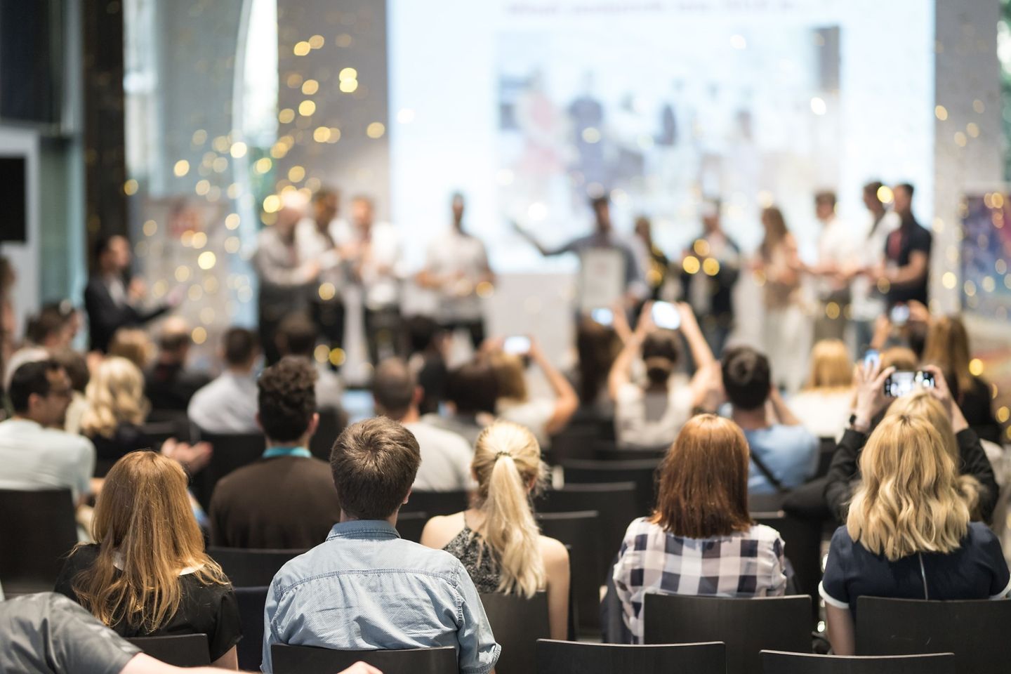 Audience in front of a stage.