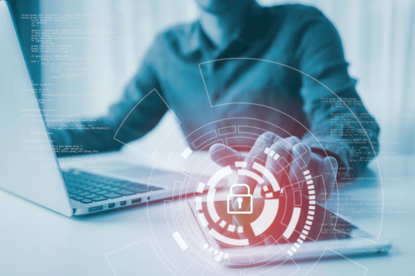 The hand of a man touches a security lock that is hovering above an iPad.