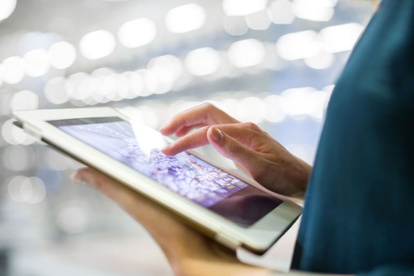 Woman using tablet in office