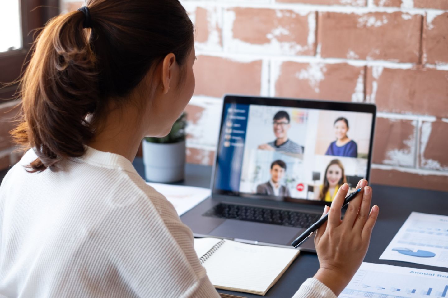 Asian businesswoman work at home and virtual video conference meeting