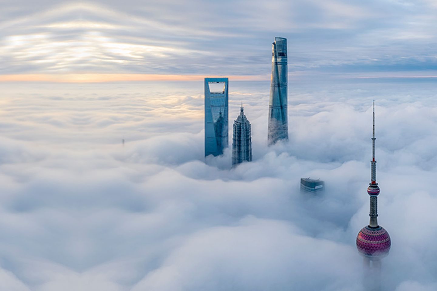 Towers rising from clouds