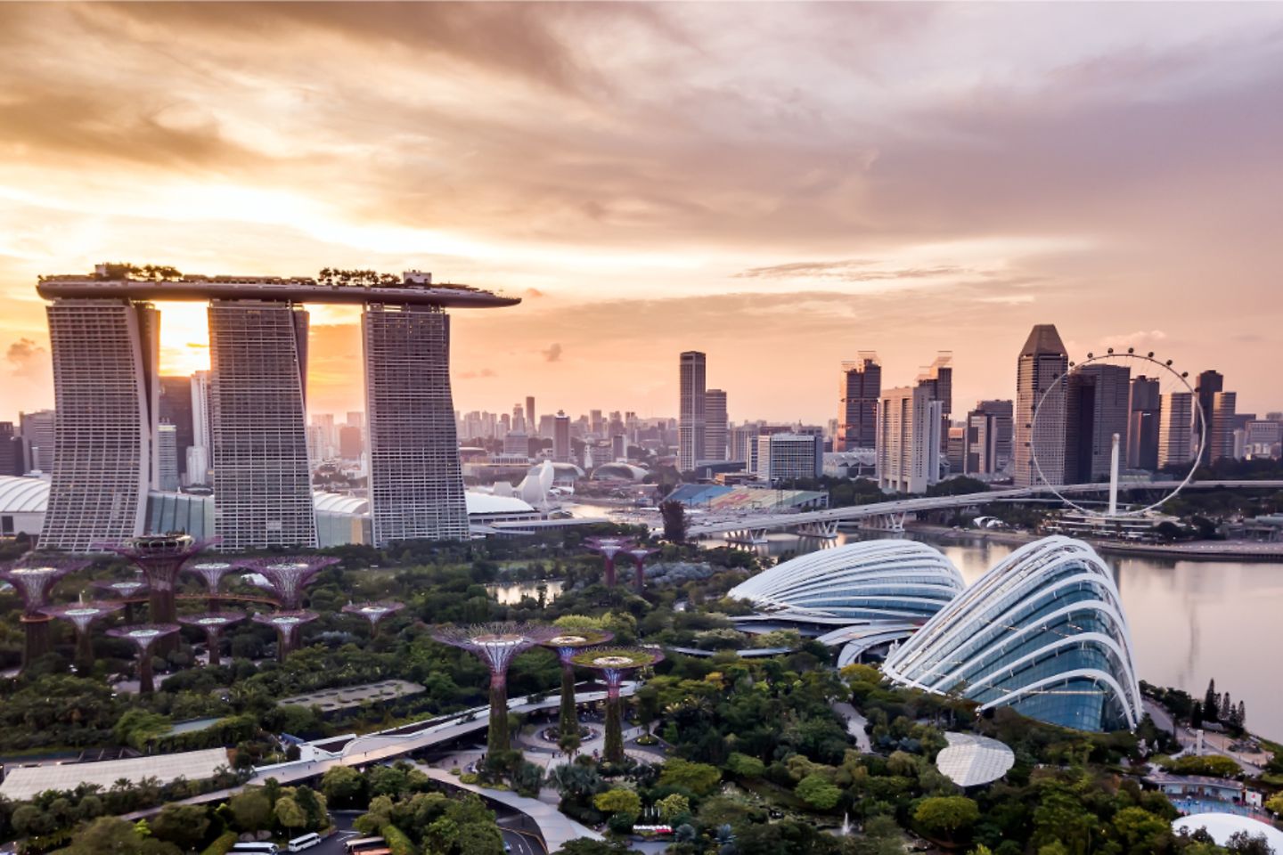 Aerial view of Singapore city skyline at sunset