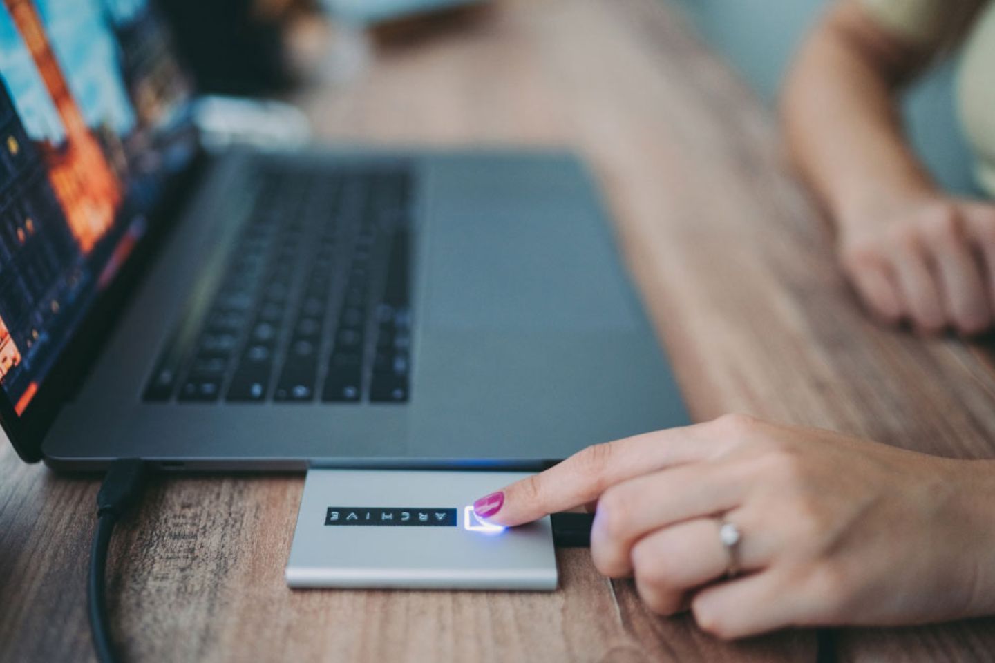 A women is scanning her fingerprint