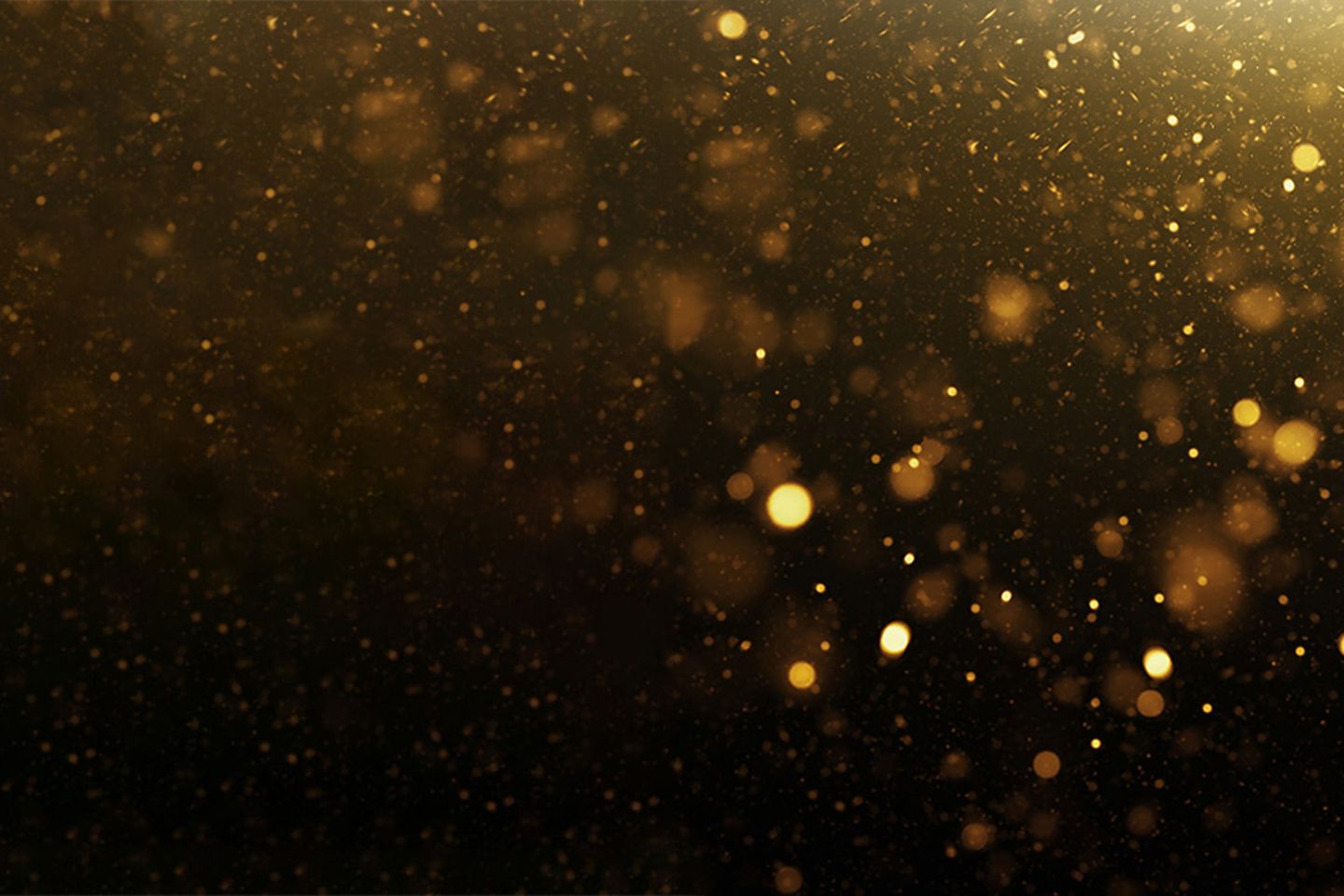 Golden Glittering Bokeh Background