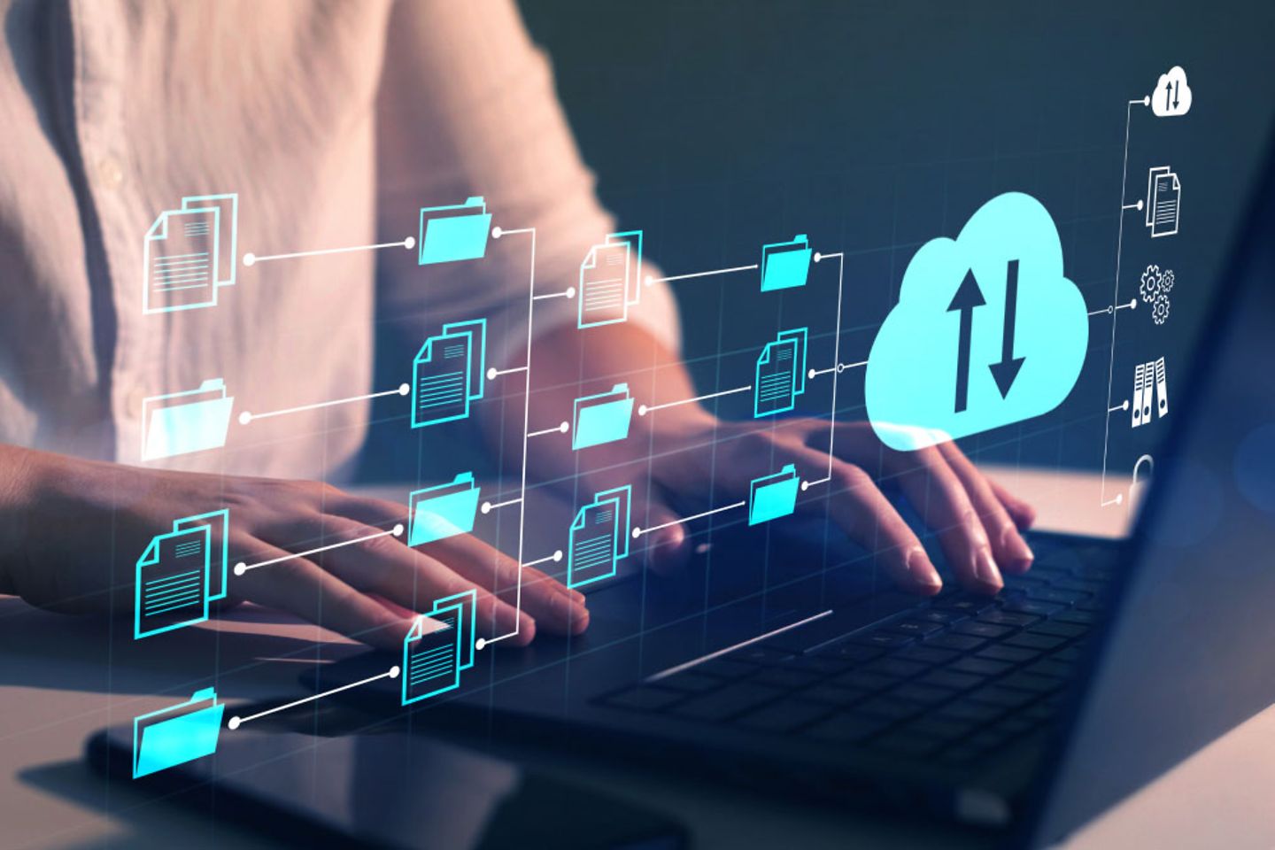 A man is working on a laptop superimposed by a diagram of files in the cloud 