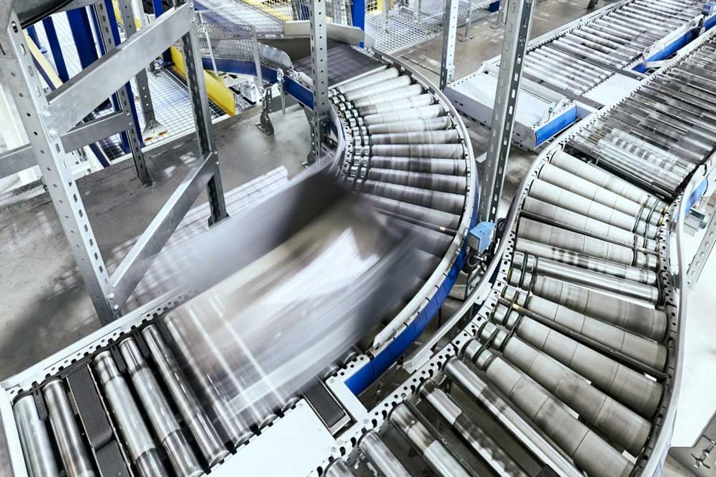 A moving conveyor belt in a factory