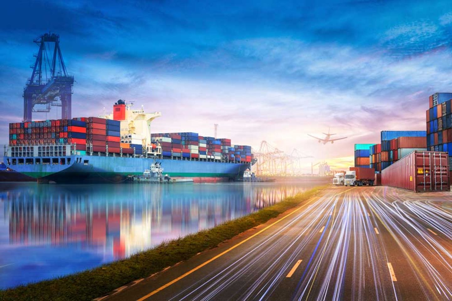 Containers on a ship, a plane, and trucks in a busy shipyard