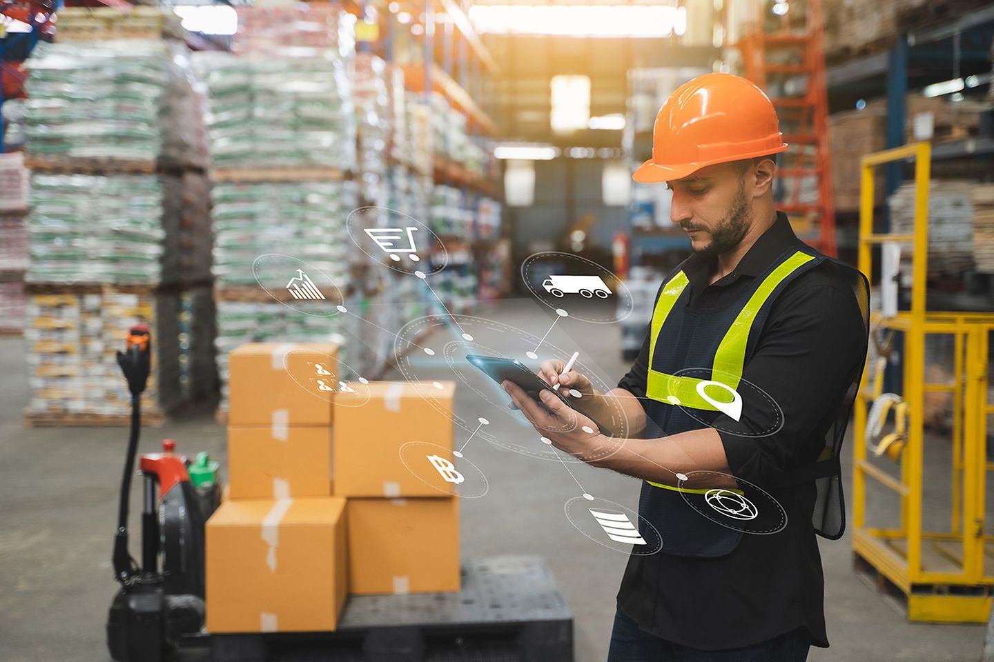 Warehouse employee analysing data to better optimise the supply chain