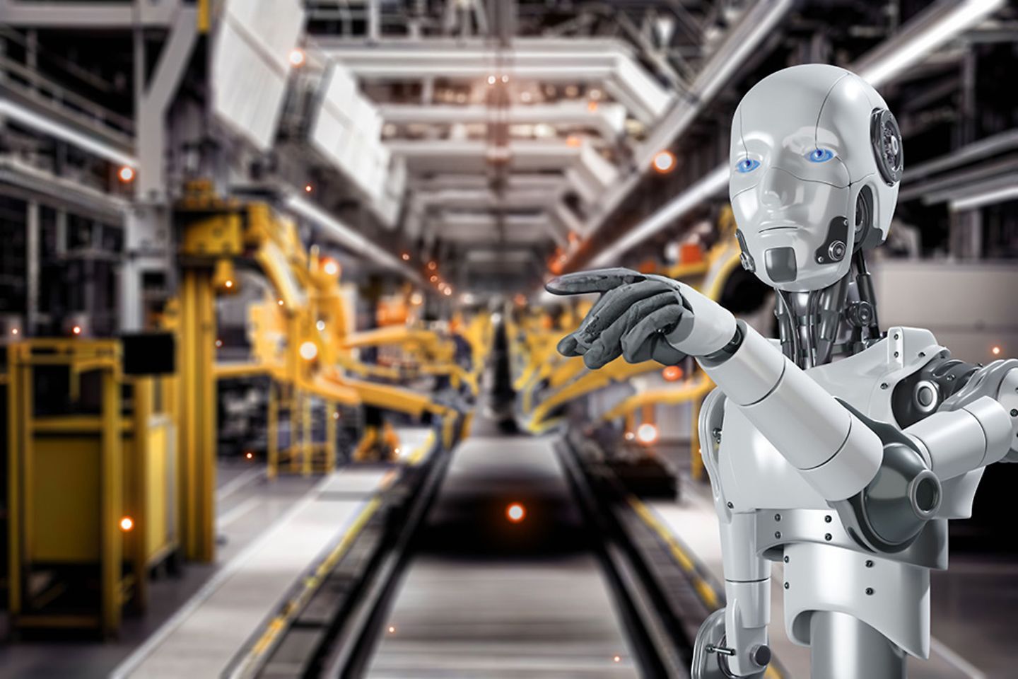 Robot humanoide ante una interfaz digital en la sala de producción