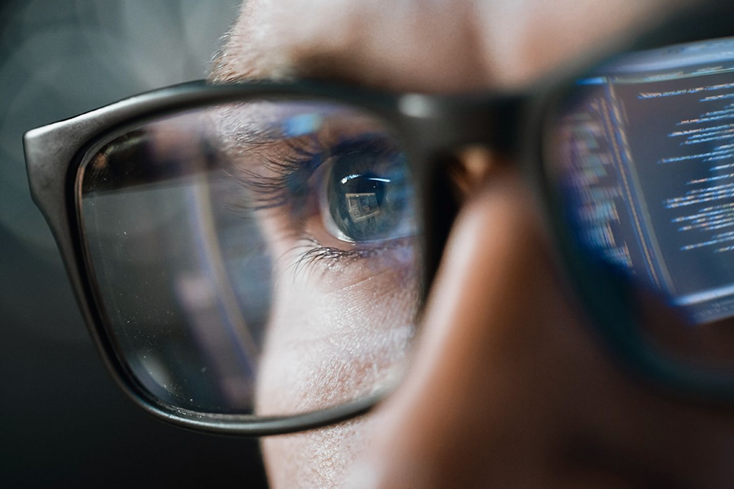 Close-up portrait of software engineer working on AI app