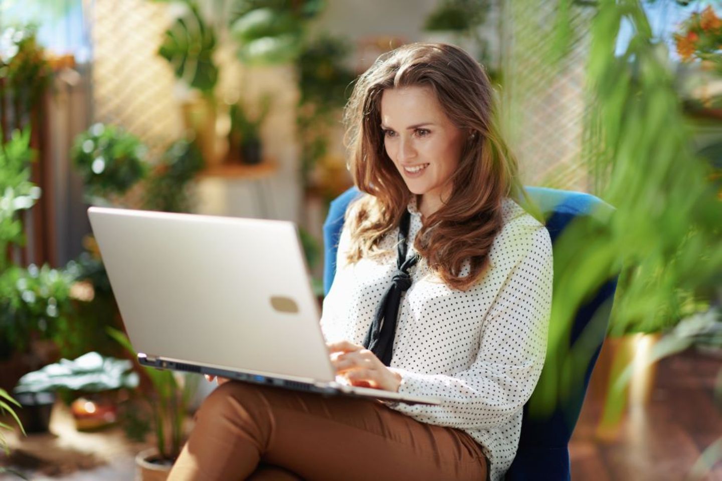 Administrative officer at the computer in green office