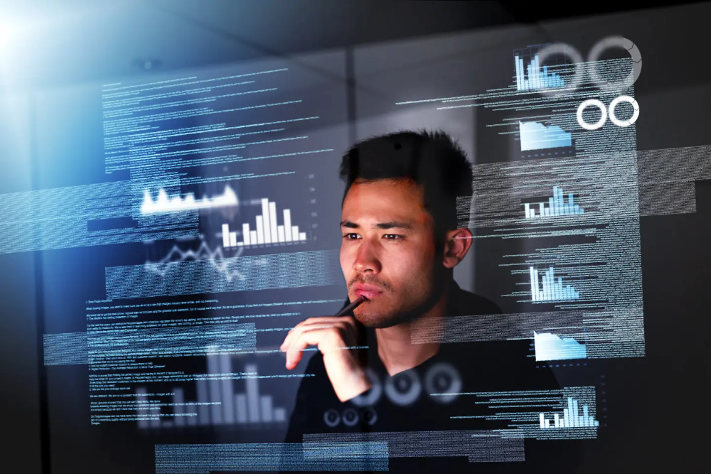 Employee analysing data to understand and prevent ransomware threats